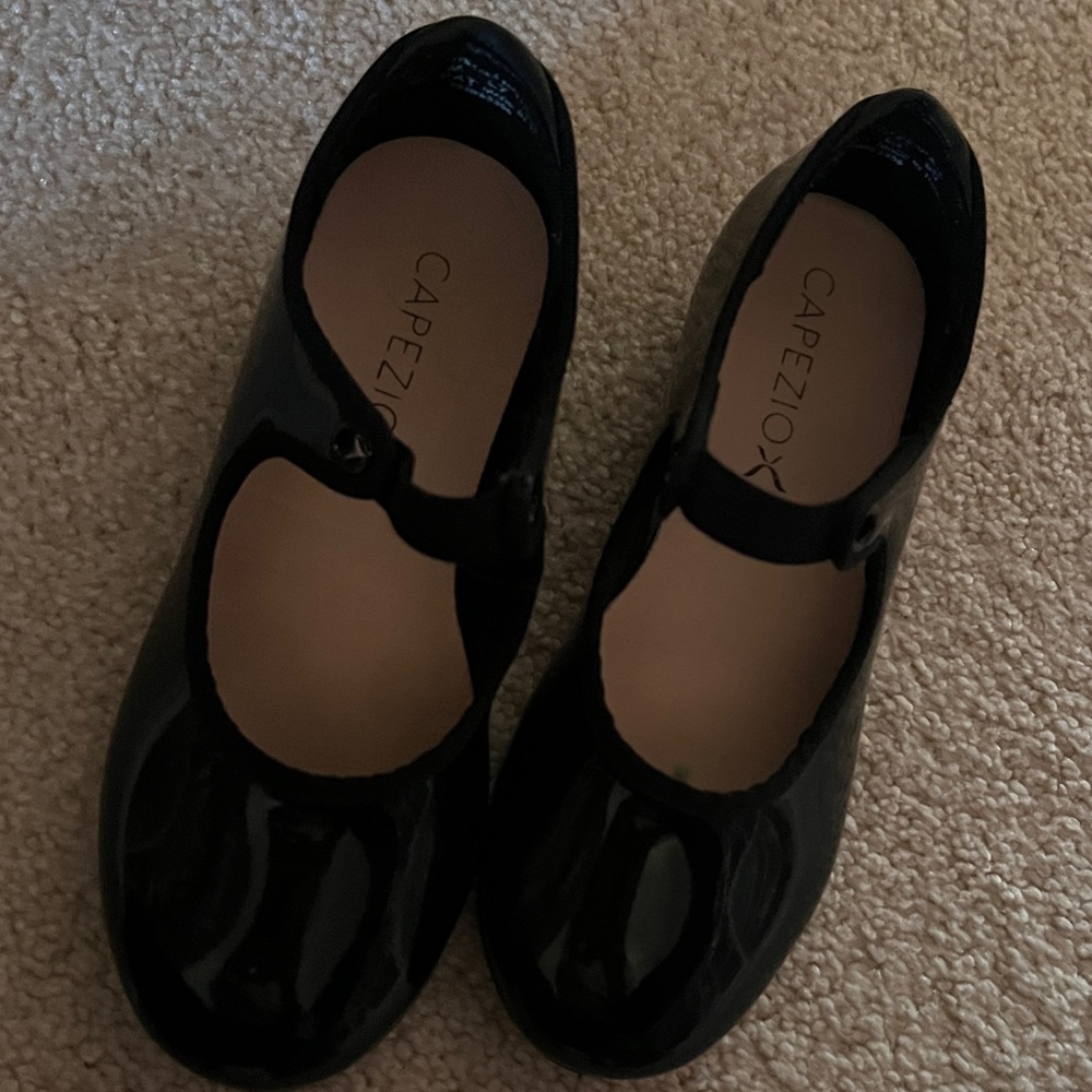 12M size. Tap shoes. Black. Barely worn.